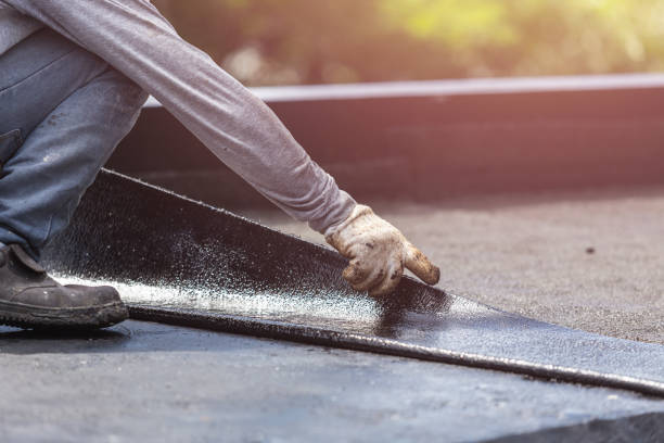 Professional Basement Waterproofing technician working in Chase, KS